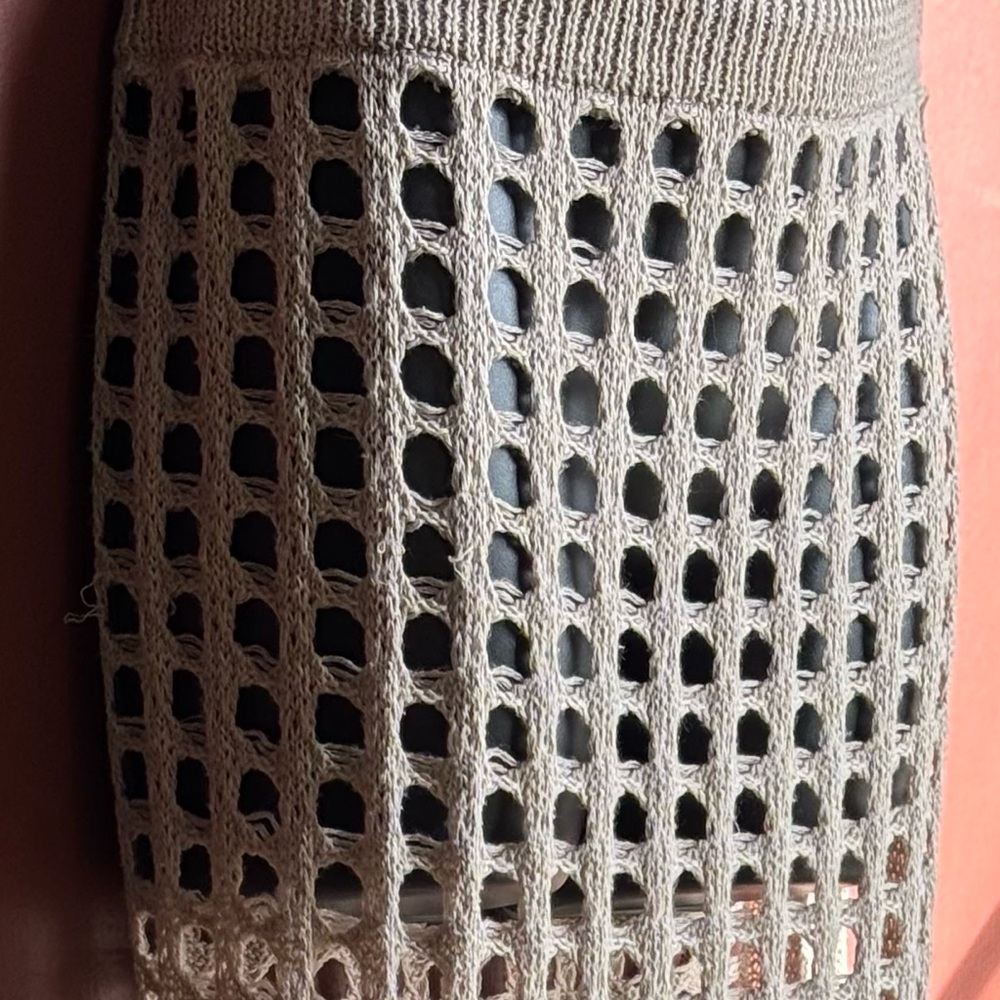 Cream-colored loose-knit sarong-style skirt/cover-up